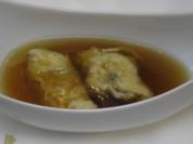 Steinpilzessenz mit grünen Ravioli - Rezept