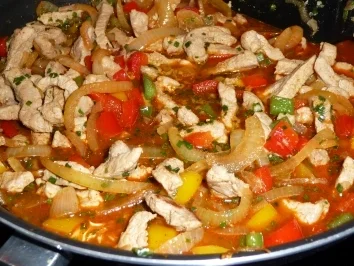 Schweinegeschnetzeltes mit Paprika & Zwiebeln - Rezept - Bild Nr. 9