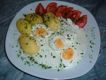 Eier in Kräutersauce - Rezept