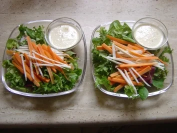 Möhren-Selleriesalat mit Orangencreme - Rezept