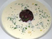 Sauerkraut-Champagnersuppe mit Blutwursttalern - Rezept