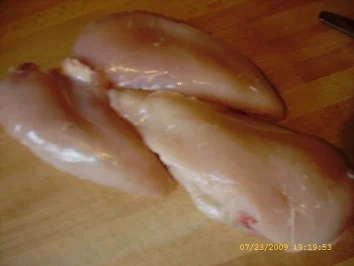 Rezept: In Tomatensauce geschmorte Hähnchenbrust an bunten Bratkartoffeln Bild Nr. 2 In Tomatensauce geschmorte Hähnchenbrust an bunten Bratkartoffeln - Rezept - Bild Nr. 2