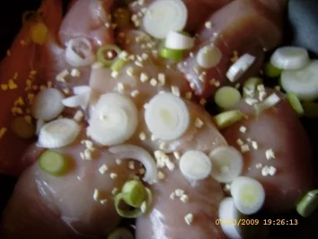 Rezept: In Tomatensauce geschmorte Hähnchenbrust an bunten Bratkartoffeln Bild Nr. 6 In Tomatensauce geschmorte Hähnchenbrust an bunten Bratkartoffeln - Rezept - Bild Nr. 6