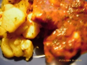 Rezept: In Tomatensauce geschmorte Hähnchenbrust an bunten Bratkartoffeln Bild Nr. 20 In Tomatensauce geschmorte Hähnchenbrust an bunten Bratkartoffeln - Rezept - Bild Nr. 20