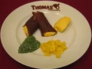 Schokoladencrepes-Cannelloni mit Mangoragout - Rezept