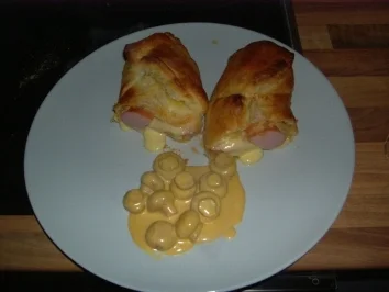 Fleischwurst im Schlafrock - Rezept