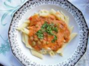 Pasta Marille el sugo con piselli - Rezept