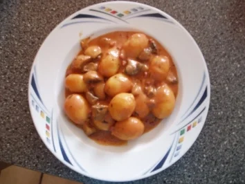 Rezept: Gnocchi mit Tomaten-Rahm-Champignons Gnocchi mit Tomaten-Rahm-Champignons - Rezept