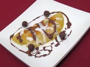 Dünne Pfannküchlein mit Äpfelchen in Kokos und Kokosplätzchen - Rezept