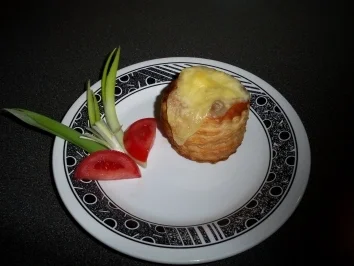 Gratinierte Königspastete mit Kanienchenragout gefüllt - Rezept