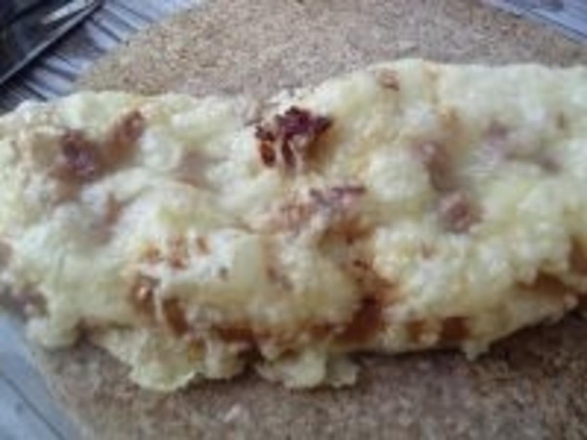 Laugenstangerl mit Käse-Schinken überbacken - Rezept