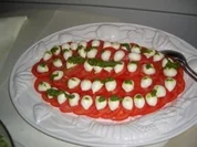 Gäste-Tomaten mit Mozarellakugeln - Rezept