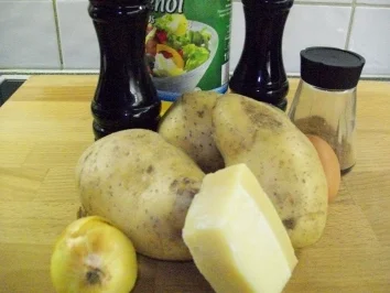 Rezept: Medaillions unter Tomate-Basilikum-Mozarella-Haube auf Erdapfel-Parmesan-Rösti Bild Nr. 12 Medaillions unter Tomate-Basilikum-Mozarella-Haube auf Erdapfel-Parmesan-Rösti - Rezept - Bild Nr. 12