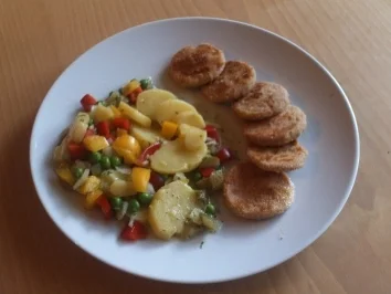 Geflügelfleischwursttaler mit Kartoffelsalat - Rezept