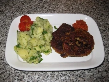 Rezept: Hacksteaks mit Kartoffel-Rucola-Salat Hacksteaks mit Kartoffel-Rucola-Salat - Rezept