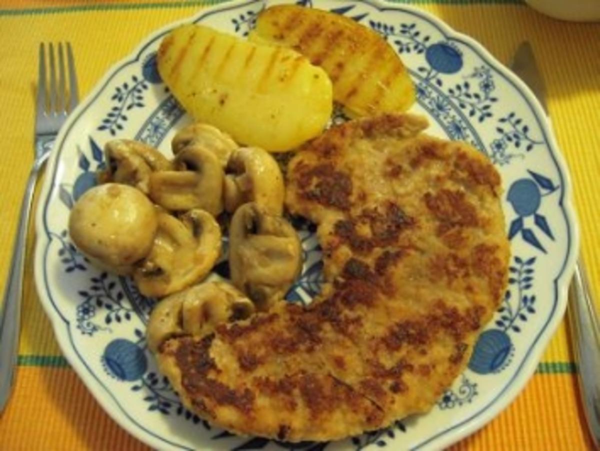 Schnitzel mit Champignons und Grillkartoffeln - Rezept