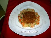 Gemüsereis mit Schweinefiletstreifen - Rezept