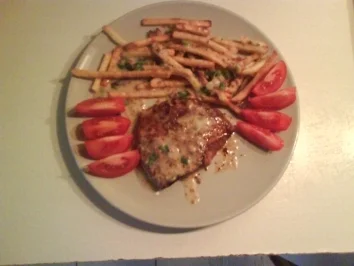 Rezept: Geflügel: Putenschnitzel mit Pommes und Austernpilzsoße Geflügel: Putenschnitzel mit Pommes und Austernpilzsoße - Rezept