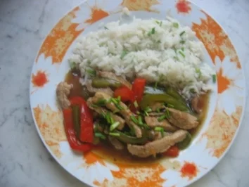 Geschnetzeltes mit Paprika und Reis - Rezept