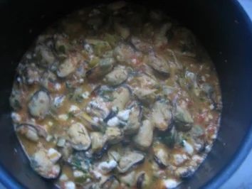 Rezept: Muschel-Pfanne mit Tomate und Feta Muschel-Pfanne mit Tomate und Feta - Rezept