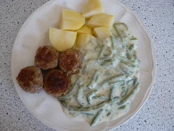 Rezept: Hackbällchen mit Bohnen in Sahnesoße Hackbällchen mit Bohnen in Sahnesoße - Rezept