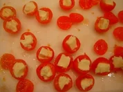 Cherrytomate mit Mozarella im Speckmantel - Rezept