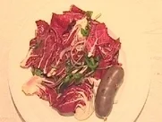 "Crudité avec boudin créoles" - Radicchio–Rucolasalat mit Blutwürstchen - Rezept
