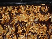 Birnen-Blechkuchen mit Schokoboden und Mandelsplittern - Rezept