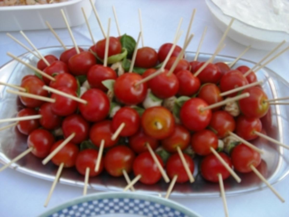 Bilder für Gäste- Kugeltomaten mit Mozzarella - Rezept