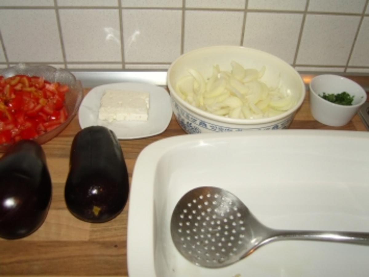 Paputsaki me krema-gefüllte Auberginen mit Bechamel - Rezept
Eingereicht von Koula