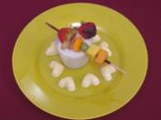 Orangenmousse mit Fruchtspießen und Kokoscreme - Rezept