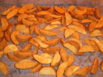 Gefülltes Schweinefilet mit Kartoffelspalten - Rezept - Bild Nr. 5