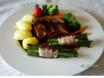 Rezept: Putenfilet mit Speckböhnchen Putenfilet mit Speckböhnchen - Rezept