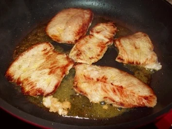 Rezept: Gratinierte Champignonschnitzel Gratinierte Champignonschnitzel - Rezept