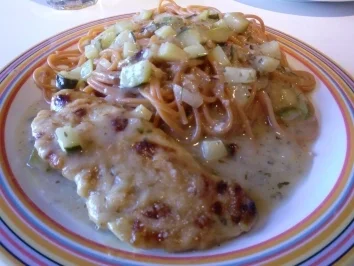 Rotbarsch in Weißwein-Zitronensoße mit Parmesanhaube - Rezept