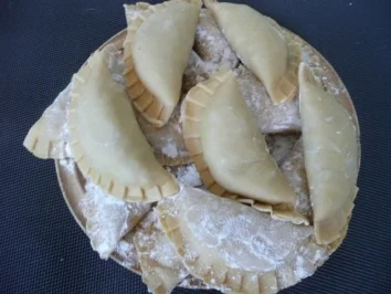 NUDELN/ Teigtaschen mit Hack-Gemüsemischung in Tomatensoße - Rezept - Bild Nr. 3