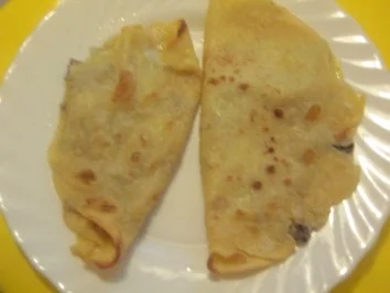 Rezept: Pfannkuchen mit Pilz-Käse-Füllung Pfannkuchen mit Pilz-Käse-Füllung - Rezept