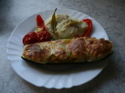 Überbackene Zucchini gefüllt mit Couscous - Rezept