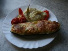 Überbackene Zucchini gefüllt mit Couscous - Rezept