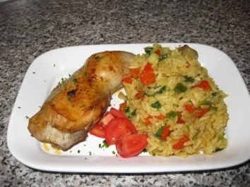 Hähnchenkeulen mit Curry-Paprika-Reis... - Rezept