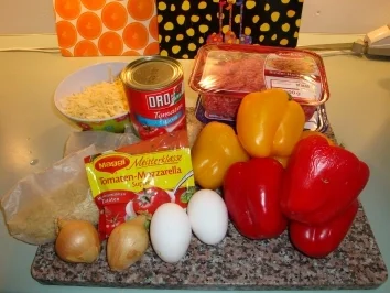 Gefüllte Paprika rot / gelb mit Reis und Tomatensosse - Rezept - Bild Nr. 2