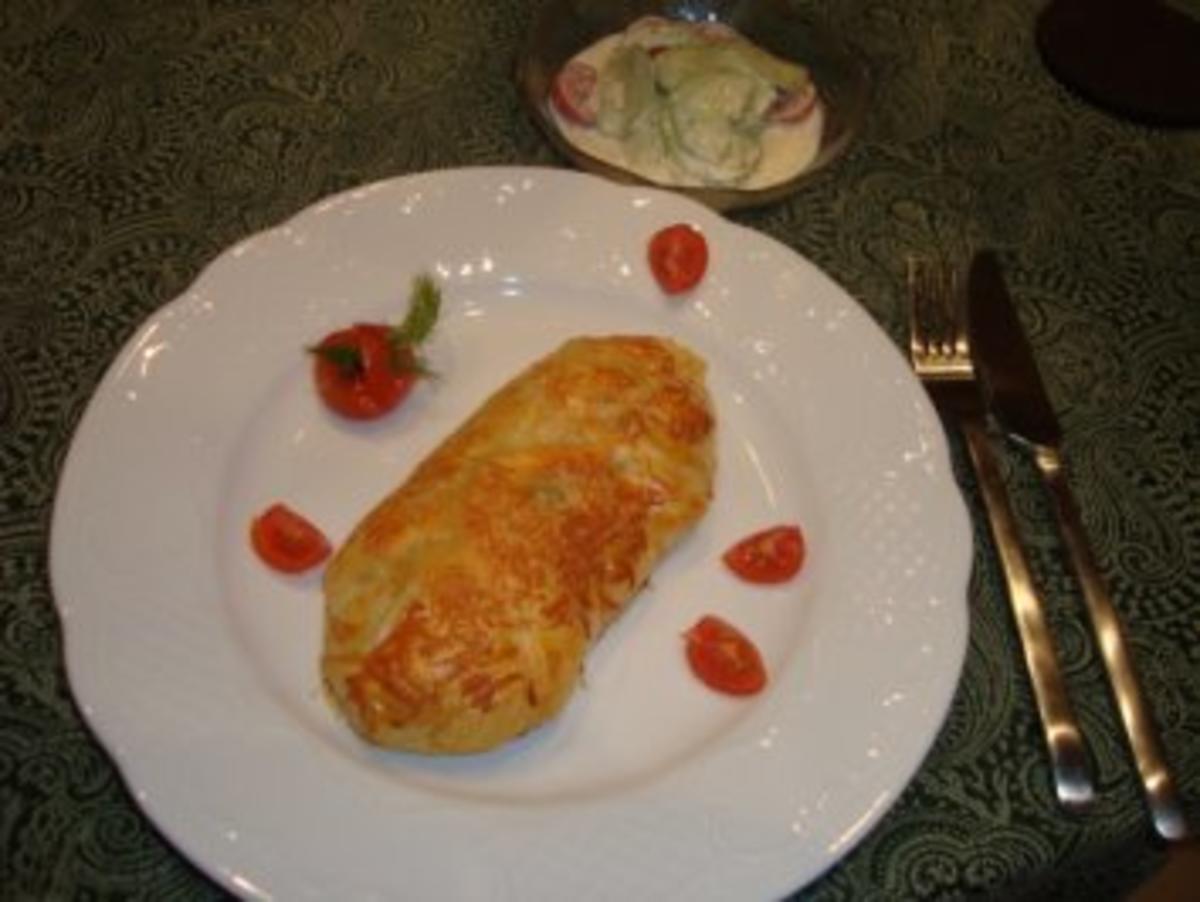 Hauptgericht - Fisch - Rotbarsch umhüllt und mit Käse überbacken - Rezept