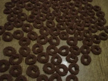Rezept: Gespritzte Schokoladenringe Bild Nr. 2 Gespritzte Schokoladenringe - Rezept - Bild Nr. 2
