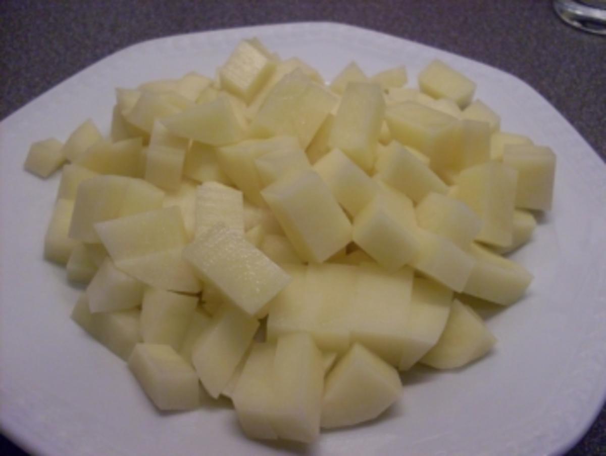 Gedünstetes Weisskraut mit Würstchen und Kartoffeln - Rezept - Bild Nr. 4