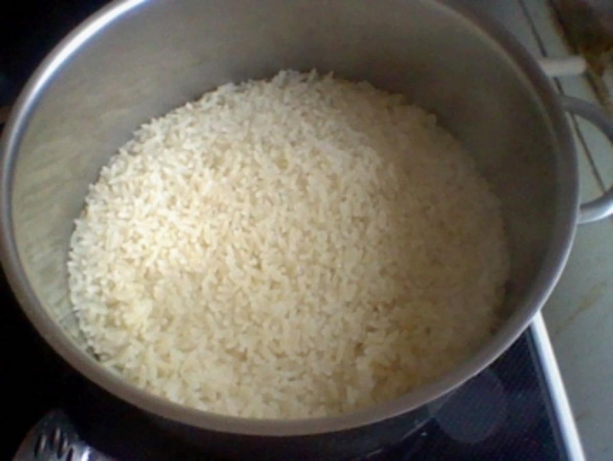 Hähnchenstreifen mit Reis und Currysoße - Rezept - Bild Nr. 2