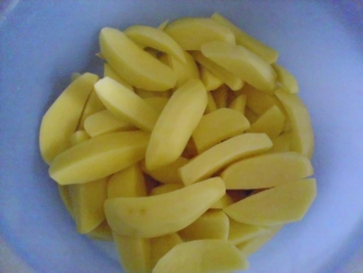 Hähncheschenkel mit Backkartoffeln und Zucchinigemüse - Rezept - Bild Nr. 5
