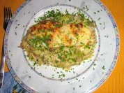 Putenschnitzel auf Bratkartoffeln gratiniert - Rezept