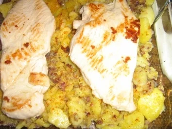 Putenschnitzel auf Bratkartoffeln gratiniert - Rezept - Bild Nr. 6