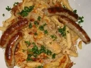 Krautspätzle mit Grillwürstchen - Rezept