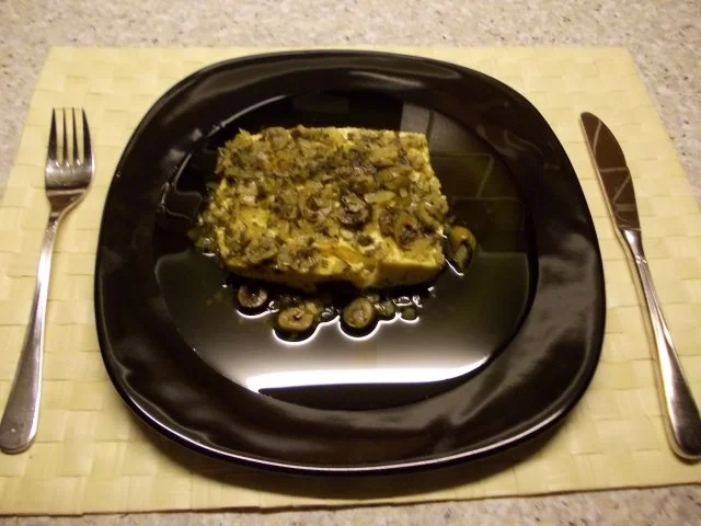 Schafskäse im Oliven-Kräuter-Bett - Rezept